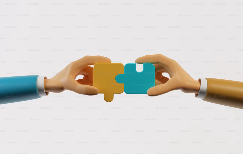 Two hands connecting puzzle pieces, symbolizing the strategic partnership between Alphathena and Rossby Financial to expand access to Direct Indexing